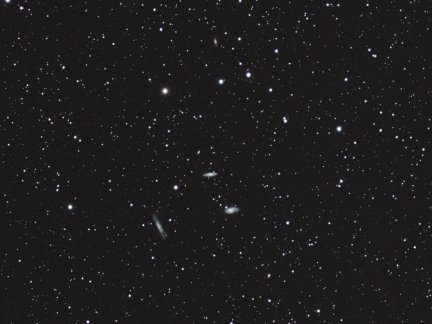 A wide-angle view of the Trio in Leo.